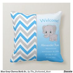 a blue and gray chevron birth pillow with an elephant on the front that says welcome