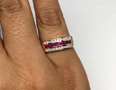 14k Yellow Gold Wide Channel Diamonds Square Princess Red Ruby Ring Size 6.5 Metal: 14k yellow gold, stamped Weight: 4.5 grams Ring Size: 6 1/2 (can be resized upon request) Width: 6.50mm wide (at widest point) Stones: Square princess cut red rubies equaling to aprx. 0.40ctw, Round cut diamonds equaling aprx. 0.30ctw, SI clarity, H-I color Hallmarked: 585 Ruby is the July birthstone This is a pre-owned piece in like new condition. Please see pictures for reference. Gold Ruby Ring Channel Set For Anniversary, Luxury Gold Rectangular Ruby Ring, Anniversary Ruby Ring In Yellow Gold With Channel Set, Red Fine Jewelry With Channel Set, Yellow Gold Ruby Ring With Channel Setting For Anniversary, Luxury Square Cut Ruby Ring In Fine Jewelry Style, Anniversary Yellow Gold Ruby Ring Channel Set, Red Channel Set Fine Jewelry, Luxury Yellow Gold Rectangular Ruby Ring