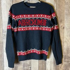 Abercrombie Spellout Sweater New With Tags! Size 11/12 Blue, White, And Red Casual Christmas Sweater For Cold Weather, Winter Cotton Top With Fair Isle Pattern, Cotton Fair Isle Winter Tops, Winter Fair Isle Pattern Cotton Tops, Casual Fair Isle Pattern Tops For Christmas, Cotton Fair Isle Pattern Tops For Winter, Cotton Fair Isle Pattern Top For Fall, Casual Winter Fair Isle Pattern Top, Casual Red Fair Isle Pattern Tops