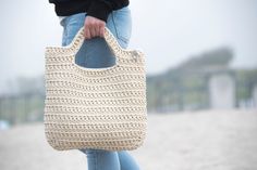 Stylish, roomy, soft and cosy crochet tote bag for those who love comfortable things! 𝙎𝙄𝙕𝙀 Approx. Dimensions of the finished tote bag: H e i g ht: ± 35 cm (13.8 inches) and ± 40 cm (15.7 inches) with handles. W i d t h : ± 37 cm (14.6 inches) 𝙒𝙀𝙄𝙂𝙃𝙏 Approx. 0.650-700 gr/1.43-1.54 lb 𝘾𝙊𝙇𝙊𝙍 𝙊𝙉 𝙋𝙃𝙊𝙏𝙊 6. Cream ✘Rope with UV protection! In to continual outdoor sunlight exposure does not changes the color. ✘Please note that colors may vary due to your computer's settings, monito Modern Crochet Shopping Bag With Double Handle, Modern Crochet Bag With Double Handle For Shopping, Modern Natural Crochet Bag For Everyday, Modern Rectangular Crochet Bag For Daily Use, Modern Crochet Shoulder Bag For Everyday Use, Versatile Rectangular Crochet Bag For Everyday, Chic Cream Crochet Bag For Everyday, Chic Cream Everyday Crochet Bag, Chic Rectangular Crochet Bag For Everyday