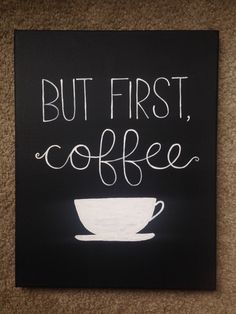 a sign that says, but first coffee on the floor with a cup and saucer