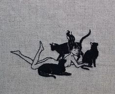 black and white drawing of cats on top of a woman