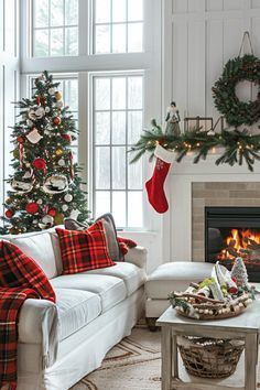 a living room filled with furniture and a fire place covered in christmas stockings next to a fireplace