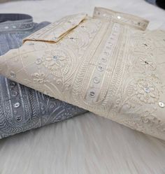 **Visit our store for full collection: https://www.etsy.com/shop/DesiGiftsUSA ** * High-quality cotton Silk fabric construction, complemented by intricate embroidery and sequins, makes this 2 piece set perfect for formal occasions. * Fully Embroidered work  * Ready to Wear  * Kurta color : Available in both gray and cream shade * Pajama color : Same as the Kurta (gray and cream shade) * Fabric : Luxurious Cotton Silk Blend * Design KP- 1168 Disclaimer: Actual color of the dress may slightly vary Cotton Wedding Set With Intricate Embroidery, Cotton Self Design Kurta For Wedding, Cotton Wedding Kurta With Self Design, Cotton Kurta With Self Design For Wedding, Wedding Cotton Kurta With Self Design, Embroidered Sets For Festival Celebrations, Wedding Cotton Set With Intricate Embroidery, Cotton Traditional Wear With Dabka Work For Party, Cotton Chikankari Embroidery Kurta For Party