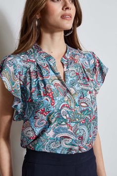 Our bohemian inspired Royal Paisley Print speaks the Language of Summer. The soft flutter sleeves lend a femme twist to this luxe Georgette top. With its contour pleat-detail neckline, it is perfect for layering with your favorite jacket or wearing on its own with white Denim. T-Tahari Paisley Print Flutter Sleeve Shirt Runs true to size. Model is 5'9" and wearing size S Dry Clean Only Imported Style #: THF44011 Georgette Tops, Flutter Sleeves, Pull On Pants, White Denim, Paisley Print, Flutter Sleeve, Shirt Sleeves, Sleeve Shirt, Paisley