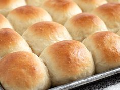 freshly baked rolls on a baking sheet ready to go into the oven