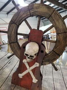 a wooden wheel with a skull on it