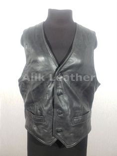 Women's vest made of genuine leather. Black vest with buttons, 100% Original leather Vest For Ladies, Bikers vest, Women Motorcycle Vest *return policy* We do not compromise on quality and comfort. Return and Refund Policy: This item includes a 100% Money Back Guarantee! If you are not completely satisfied with your purchase for any reason, you received damaged, faulty product or you did not receive the size that you originally ordered, just send it back to our return address and we will issue y Sleeveless Leather Jacket For Biker Events, Sleeveless Biker Leather Vest Jacket, Sleeveless Biker Leather Vest, Classic Sleeveless Leather Vest, Leather Biker Vest Sleeveless, Fitted Leather Biker Vest, Biker Style Leather Sleeveless Vest, Sleeveless Leather Vest For Biker Events, Sleeveless Leather Vest For Bikers