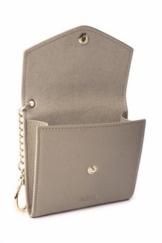 - Perfect card purse that fits in all day and night bag. - Fits 10 - 15 cards - 4 card slots to organize your cards. - Metal strap chain & hook - 10 x 9.5 x 2 cm (4 x 3.75 x 0.8 inch) - Scratch-resistant & water-resistant vegan grain leather with less impactful on the environment compared to animal leathers. - Lining: Soft suede vegan leather & our signature waterproof lining. - Color: Taupe Rectangular Wallets With Chain Strap As Gift, Rectangular Travel Wallet On Chain With Card Slots, Everyday Rectangular Wallet With Chain Strap, Rectangular Wallets With Chain Strap For Everyday Use, Rectangular Wallet On Chain With Card Slots As Gift, Card Purse, Metal Straps, Day Night, Soft Suede