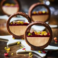 three desserts are arranged in the shape of circles