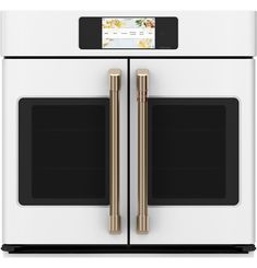 the double oven is white with gold trimmings and two doors on each side