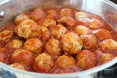 the meatballs are covered in marinara sauce and have been cooked for several hours