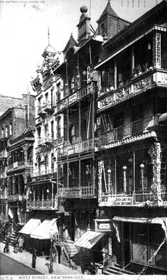 an old black and white photo of some buildings