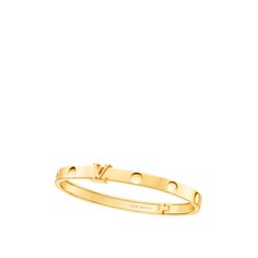 To reserve online today and experience in store tomorrow, select “collect in store” at checkout. This empreinte bangle in 18-carat yellow gold features the trunk-nail imprints, a timeless house signature. The iconic lv initials join here the collection and serve as a clasp for this strong hinged bracelet. The empreinte bangle can be worn stacked on the arm with other bracelets, for a stylish, modern look. Designer Yellow Gold Bangle Bracelet, Luxury Yellow Gold Engraved Bangle, Luxury Engraved Yellow Gold Bangle, Louis Vuitton Gifts, Men's Brooch, Micro Bags, Louis Vuitton Official Website, The Bangles, Louis Vuitton Empreinte