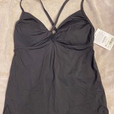 Nwt Athleta Tankini Swim Top. Size Med Tall. Sporty Solid Sleeveless Tankini, Sporty Solid Color Workout Tankini, Sporty Solid Color Tankini For Workout, Seamless Sleeveless Sports Tankini, Athleisure Style Solid Color Workout Tankini, Solid Color Athleisure Tankini For Workout, Seamless Sleeveless Tankini For Sports, Casual Moisture-wicking Sports Tankini, Casual Moisture-wicking Tankini For Sports