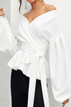 Details: Material: Cotton, Polyester Style: Elegant Pattern Type: Solid Element: Bandage, With Bow Neckline: V Neck Sleeve Style: Lantern Sleeve Sleeve Length: Long Sleeve Fit Type: Regular Clothing Length: Short Closed Type: Pullover Type: Solid Color Size(in) Length Bust Sleeve Length S 24 45.3 20.9 M 24.4 47.2 21.3 L 24.8 49.2 21.7 XL 25.2 51.2 22 2XL 25.6 53.1 22.4 Tips:Due to the many variations in monitors, the color in the image could look slightly different, please take physical design a Night Fashion, Lantern Sleeve Top, Dressy Blouse, Blouse Material, Peplum Blouse, Blouse Outfit, Ladies Dress Design, Long Blouse, Blouse Styles