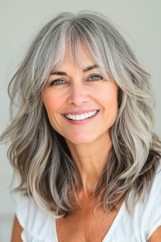 Textured Layers with Bangs Hairstyle for Women Over 40 with Bangs. Modern Lob Haircut, Hairstyle For Women Over 40, Ash Blonde Hair With Highlights, Bangs Over 40, Layers With Bangs, Silver Hairstyles, With Bangs Hairstyle