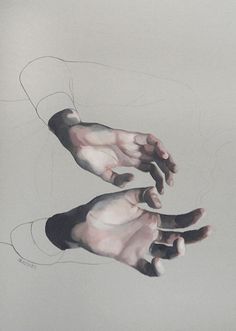 two hands reaching towards each other in the air