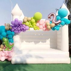 an inflatable arch decorated with balloons