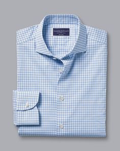 52% Cotton, 41% Nylon, 7% Elastane ​, Available in classic and slim fit, Non-iron and added stretch, Lightweight, breathable and moisture wicking, Semi-spread collar, Rounded single cuff with one button, Classic and slim fit: back pleats, Machine washable and cool iron only - Non-Iron Performance Twill Grid Check Shirt - Ocean Blue | Men's Charles Tyrwhitt Non-Iron Performance Twill Grid Checkered Dress Shirt - Ocean Blue Single Cuff Size Medium Cotton Charles Tyrwhitt Shirt, Business Casual Shirts, Charles Tyrwhitt, Checkered Dress, Twill Shirt, Check Shirt, Ocean Blue, Blue Ocean, Dress Shirt