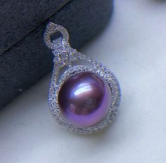 Stunning Big Freshwater Pearl Pendant, 12mm, Metallic Rich Deep Purple Color, Very High Luster.  Sterling Silver S925 with sparkling cubic zircons, Very Well made, Lovely and Stunning.   Classic and Stunning   Lustrous Beauty   Super Value  Pearl ★ Pearl: Genuine Freshwater Pearl, Edison  ★ Size: 12mm ★ Shape: Near Round ★ Color: Natural Untreated, Metallic Rich Deep Purple Color, Charming and Stunning ★ Luster: Very High Luster, wonderful ★ Surface: Nice, Smooth and Mirror Like, Mostly Clean Findings ★ Sterling Silver S925 with sparkling cubic zircons, Very well made Shipping FREE with USPS First Class in US. Edison Pearls, Deep Purple Color, Ear Jewelry, Pearl Pendant, Deep Purple, Purple Color, Fresh Water, Favorite Jewelry, Freshwater Pearls