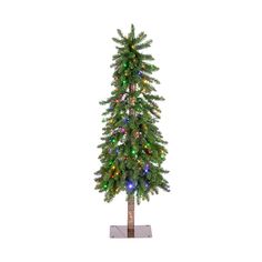 a small christmas tree with multi - colored lights on it's base, in front of a white background