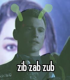 a man holding a cell phone in front of a screen with the words zib zab zub on it