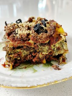 a stack of food sitting on top of a white plate