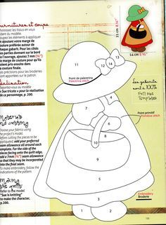 the paper doll is wearing a hat and dress