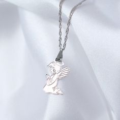 More finish options:Gold Carry your guardian angel with you at all times with this dainty necklace. It's a perfect reminder that you are always protected and guided. Guardian AngelA guardian angel is a type of angel that is assigned to protect and guide a particular person. The belief is that guardian angels serve to protect whichever person God assigns them. They are here to help us and guide us through our lives. Call on them whenever you need assistance with any area of your life. The more yo Silver Angelic Jewelry For Gift, Angelic Silver Jewelry For Gift, Angelic Sterling Silver Jewelry For Gifts, Types Of Angels, Guardian Angel Necklace, Your Guardian Angel, Angel Necklace, Guardian Angels, Eco Friendly Jewelry