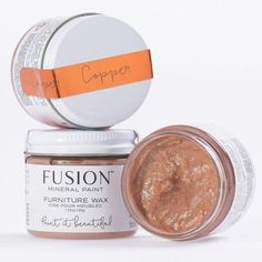 a jar of fuson furniture wax next to a container with it's lid open