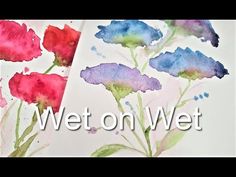 watercolor flowers painted on paper with the words wet on wet written in front of them