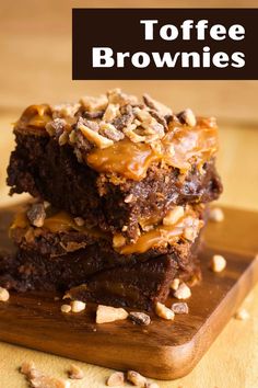 two brownies stacked on top of each other with caramel drizzle and nuts