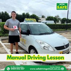 a man standing next to a car with the words manual driving lesson written on it