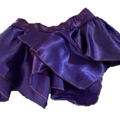 a purple skirt with ruffles on the bottom