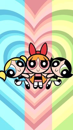 the powerpuff girls are standing in front of a heart