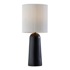 a black table lamp with a white shade