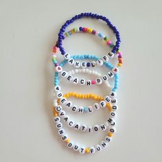 Custom Seed Bead Name Bracelet Set. Each Set Comes With 5 Bracelets For $27. Strung On Strong Stretch Cord. Brand New Condition. Ships Next Business Day Offers Are Welcome Personalize Your Stack With Your Favorite Summer Phrase, Your Name, Special Date, Or Occasion. Message Me With Your Desired Size, Color, And What You Want Your 5 Bracelets To Say. Choose From All The Colors Pictured Above. Sizes: Xs 6", S 6.5", M 7", L 7.5", Xl 8" Example 1) Name Melissa, Color White, Size 7 2) Names Ava Nora Tristan, Dark Blue, Size 8, Heart Beads On Each Side 3) Date 12-5-04, Color Red, Size 6, Smiley Face Beads On Both Sides If You Want More Than 5 Bracelets Let Me Know And I'll Make You A Spe Word Bracelets Beads, Friendship Bracelet Patterns With Beads, Bracelet Sayings, Buissnes Ideas, Seed Beaded Bracelets, Name Bead Bracelet, Bead Styles, Word Bracelets, Bracelet Business