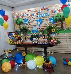 a birthday party with balloons and decorations