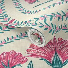 a pink and blue flowered wallpaper with green leaves on the bottom half of it