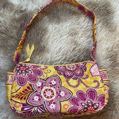 Nwot Vera Bradley Maggie Style Bag In Bali Gold Print (Retired In 2009). Bright Gold With Pink And Magenta Flowers And Decals. So Fun For Spring And Summer. The Body Of The Purse Measures 10 X 6 X 4 Inches Approximately. A Pocket On Each End Of The Purse, Two Pockets Inside, And Zip Closure. Care Instructions Still Inside! Structured Bottom. Pink Fabric Shoulder Bag For Daily Use, Pink Rectangular Fabric Shoulder Bag, Pink Fabric Rectangular Shoulder Bag, Rectangular Pink Fabric Shoulder Bag, Trendy Pink Fabric Shoulder Bag, Pink Fabric Shoulder Bag For Spring, Spring Pink Fabric Shoulder Bag, Disney Makeup Bag, Tech Pouch