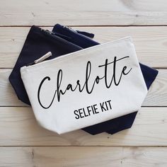 the charlotte selfie kit is sitting on top of two other items, one blue and white