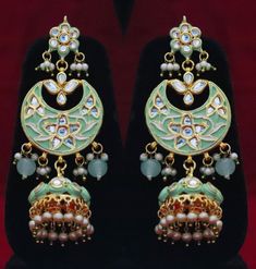 Occasion might be any, getting ready In a Sophisticated Manner Is Women'S Thing that they enjoy the most Kundan Bridal Mint Green Necklace Jhumka Earrings Jewelry Set, Indian Jadau Kundan Handmade Minakari Jewellery, Statement Jewelry Party Wear ITEM DESCRIPTION Metal = Gold Plated Occasion = Wedding ,Party Wear, Bridal Color = White and Mint Green Size = Necklace Length = 6 Inches, Earrings Size = 3.5 Inches 100% Satisfaction Guarantee: 1 Year Warranty, Long Lasting Plating, High-Quality Stones Green Fusion Style Chandbalis With Cutdana, Green Cutdana Chandbalis In Fusion Style, Green Cutdana Fusion Chandbalis, Green Cutdana Jhumkas For Celebration, Celebration Green Cutdana Jhumkas, Green Fusion Chandbalis For Celebrations, Handmade Green Festive Jhumkas, Green Fusion Chandbalis For Festivals, Green Fusion Style Chandbalis For Festivals