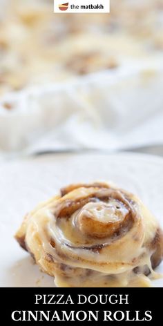 a close up of food on a plate with the words pizza dough cinnamon rolls over it