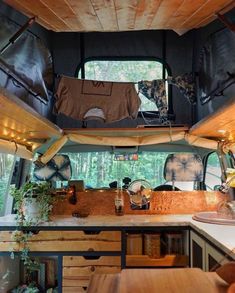 an interior view of a camper with lots of wood