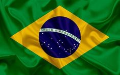 the flag of brazil is waving in the wind