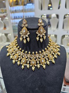 Uncut Kundan Silver Polki Choker Necklace Set with jhumka Earrings,Sabyasachi jewelry,Indian Jewellery,Bridal Necklace,Wedding Jewelry,Kundan jewelry Kundan Polki Necklace with Earrings,Sabyasachi jewelry,Indian Jewellery,Bridal Necklace, Wedding Jewelry, Kundan jewelry Indian Jewelry Set, Indian Necklace Set, Kundan Jewelry, Jadau Polki Jewelry Beautiful Kundan Polki and Pearls combo Necklace set with Colorful Glass Enamels/Meenakari on Back of Necklace and Earrings. Sparkling CZ Polki looks great on any Ethnic outfit.  Exquisite Polki CZ Stones Necklace Set as perfect Statement Piece for Formal Parties, Mehndi, Henna, Dholki, Engagement, Walima or Wedding. <>Sparkling Kundan Polki CZ Jewelry <>Necklace and earrings <>Adjustable Necklace length and Push Back Earrings NO ADDED COLORS OR FI Cz Stone Necklace, Bridal Statement Necklace, Stone Necklace Set, Sabyasachi Jewellery, Polki Necklace, Polki Jewellery, Indian Necklace, Indian Jewelry Sets, Choker Necklace Set