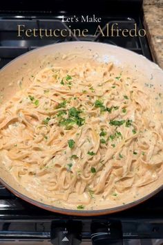 a pan filled with pasta on top of a stove