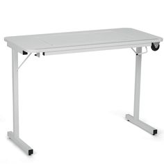 a white computer desk with wheels on the bottom and one leg raised up to it's side