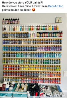 a shelf filled with lots of different types of paint